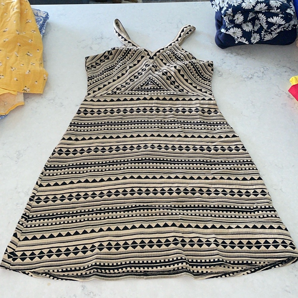 Black and tan pattern dress